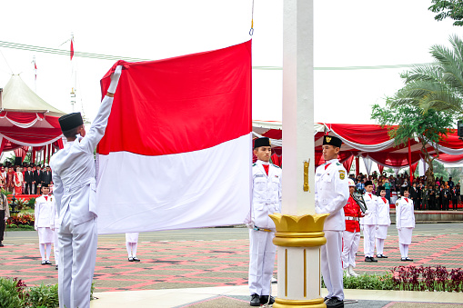 Banjarmasin, Indonesia - August 17 2017: flag raisers raise the Indonesian flag during the Indonesian independence ceremony in the city of Banjarmasin Indonesia