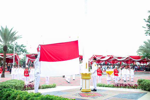 Banjarmasin, Indonesia - August 17 2017: flag raisers raise the Indonesian flag during the Indonesian independence ceremony in the city of Banjarmasin Indonesia