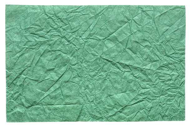 изолированная мятая листовая бумага стильного зеленого цвета. - metal verdigris textured effect textured стоковые фото и изображения