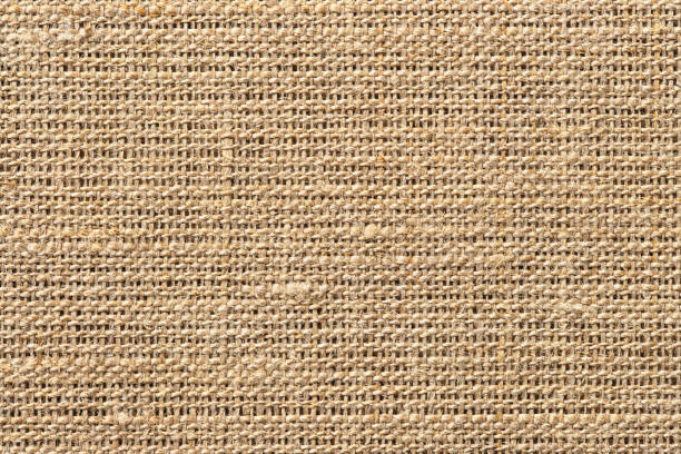 istock light brown burlap texture, natural linen fabric background 1426568564