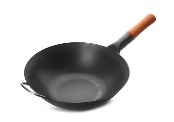 istock Empty iron wok isolated on white. Chinese cookware 1426573924
