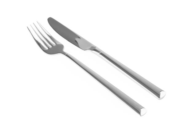 istock New shiny fork and knife on white background 1426575297