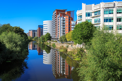 Modern riverside apartments in Leeds city centre, overlooking the river Aire.