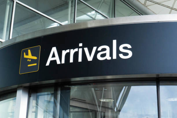 Airport Arrivals Sign situated outside Stansted Airport entrance to arrivals taken in September 2022.