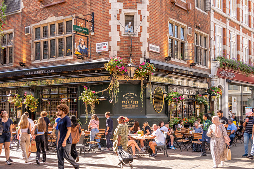 London, UK - August 25, 2022:  Shakespeare's Head pub in Carnaby Street neighbourhood, which was famous in the 1960s for its independent fashion shops.