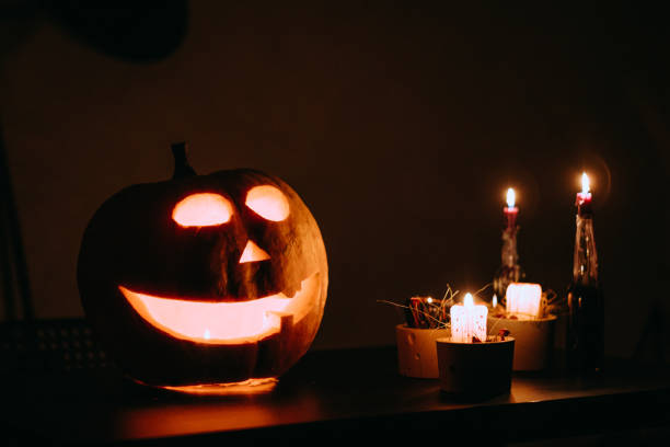 istock Jack-O'-Lantern on the table at the candlelight 1426612154