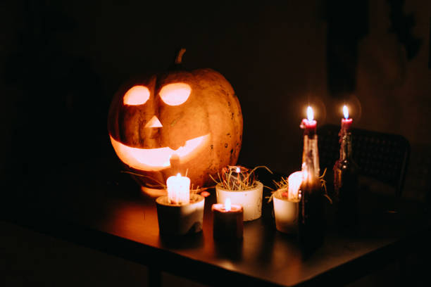 istock Jack-O'-Lantern on the table at the candlelight 1426612197