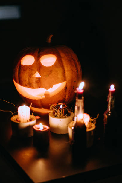 istock Jack-O'-Lantern on the table at the candlelight 1426612230