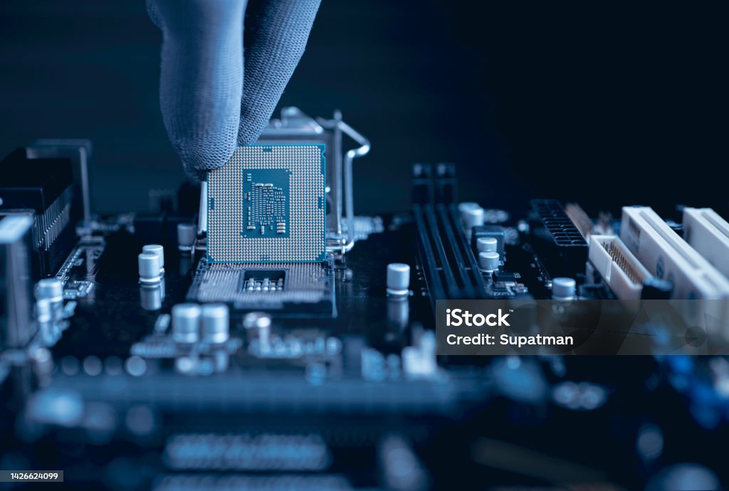 Computer Cpu Fixng Engineer Repairman Computer Uninstall Cpu Microprocessor To Motherboard ...