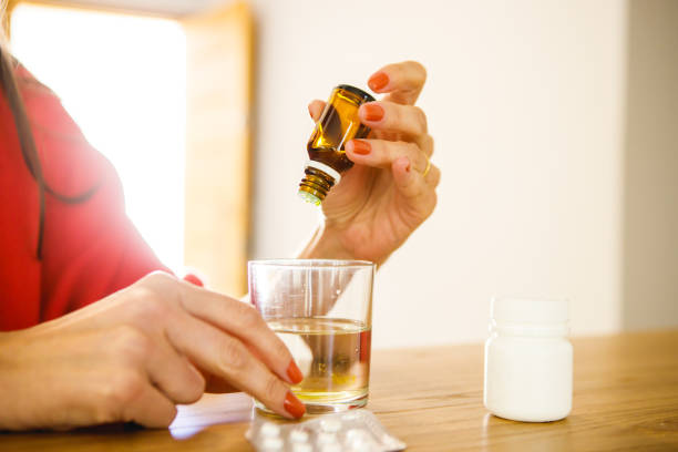 istock woman taking medicine 1426624196