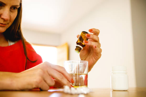 istock woman taking medicine 1426624287