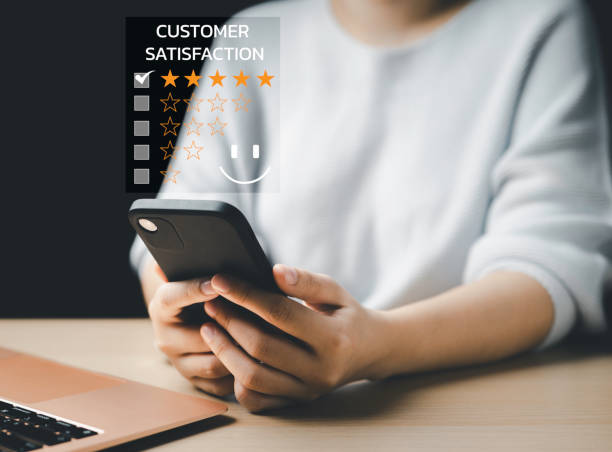 istock Users give a rating to service experience on the online application, Customer review satisfaction questionnaire feedback survey concept, Customer can evaluate the quality of service leading to reputation ranking of the business. 1426624311