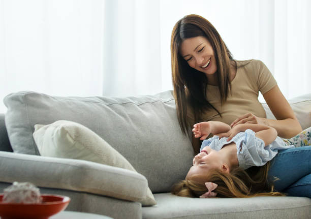 istock Mother and daughter having fun at home. 1426630796