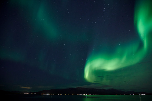 The night sky northern lights above Reykjavik ,Iceland