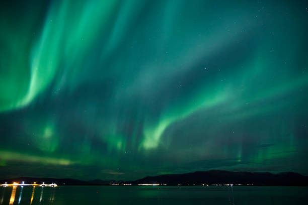 Faxaflói bay with northern lights in Reykjavik ,Iceland Faxaflói bay with northern lights in Reykjavik ,Iceland aurora borealis abstract stock pictures, royalty-free photos & images