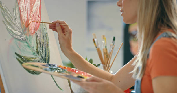 istock Art painting, creative canvas and painter with oil design in workshop, working on color drawing and inspiration for abstract creativity in studio. Woman artist with graphic artwork with brush 1426645837