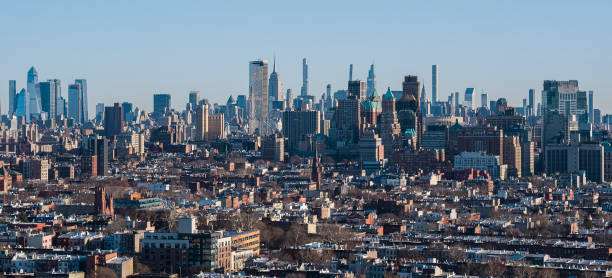istock Manhattan Midtown with Empire State Building and  Hudson Yards, view from Brooklyn. 1426647272