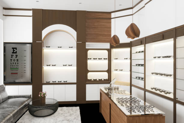 Eyeglasses Showcase And  Eye Chart In Modern Optic Shop.