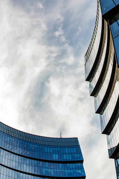 istock Modern glass office buildings with sky at background 1426661657