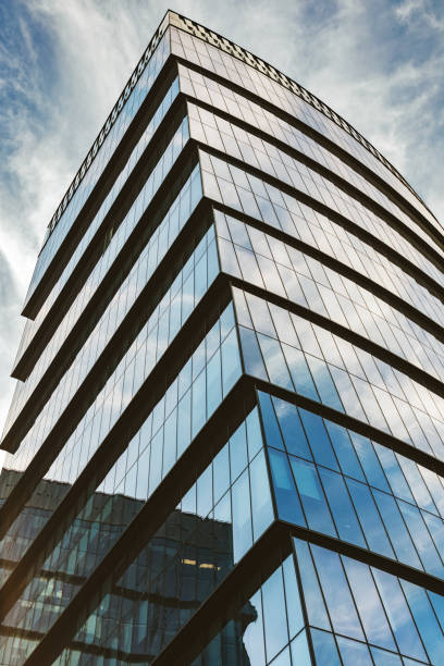 istock Modern glass office buildings with sky at background 1426661784