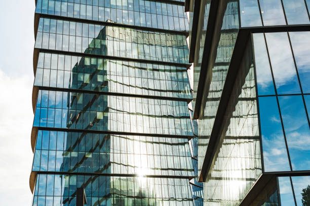 istock Modern glass office buildings with sky at background 1426661785