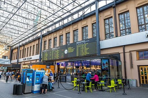 Helsinki, Finland - September 3, 2019: Main hall and online arrival and departure board of Helsinki Central Station (Finnish: Helsingin paarautatieasema) (HEC), main railway station in Helsinki