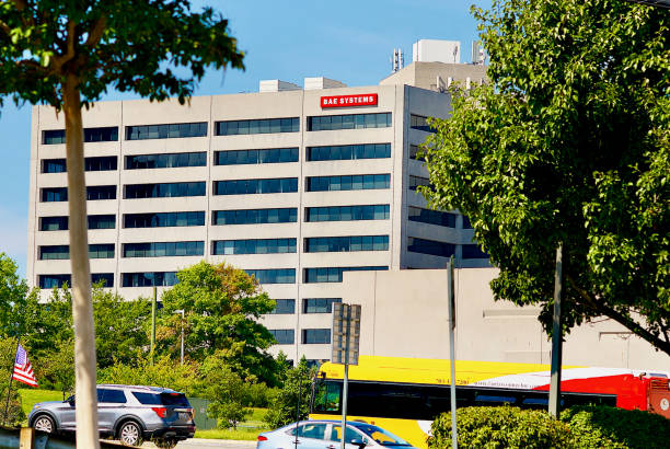 BAE Systems Building, Tysons Corner, Virginia (USA) McLean, Virginia, USA - September 21, 2022: Traffic passes the BAE Systems office building in the heart of Tysons Corner in Northern Virginia near Washington, D.C. british aerospace stock pictures, royalty-free photos & images