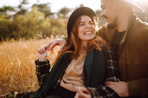 istock Lovely hipster couple resting in nature. 1426666918