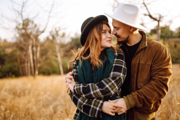 istock Lovely hipster couple resting in nature. 1426666930