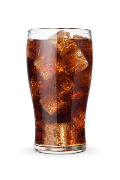 Cola in the glass with ice cubes isolated on white Cola in the high glass with ice cubes isolated on white background. coca cola stock pictures, royalty-free photos & images