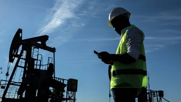 istock African American man looks at phone against beam engine 1426672285