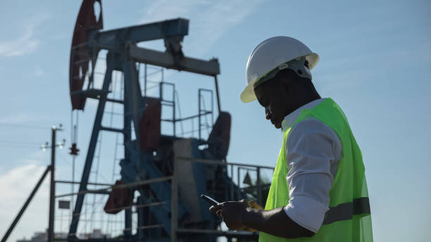 istock Black entrepreneur types report about balanced pumping unit 1426672294