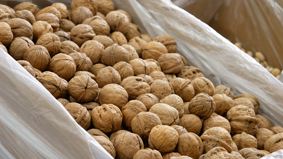 A pile of beautiful walnuts in a box