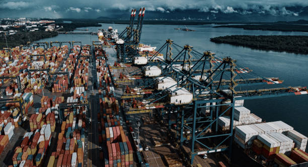 Exporting port of Santos São Paulo Brazil Aerial view from above from a drone of the port of Santos, the largest exporter in Latin America. container ship commercial dock stock pictures, royalty-free photos & images