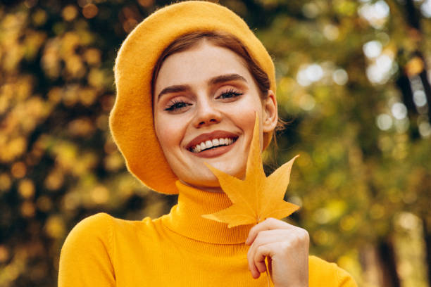 istock Beautiful woman enjoying autumn 1426681217