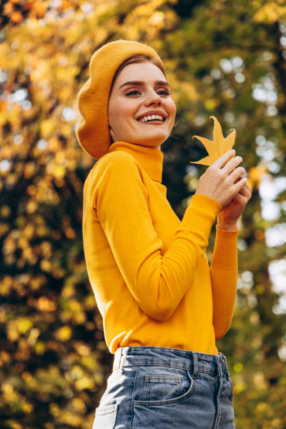 istock Beautiful woman enjoying autumn 1426681250
