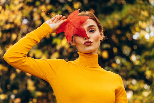 Beautiful woman enjoying autumn