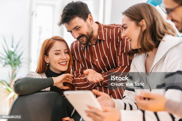 Watching Funny Videos At Work Stock Photo - Download Image Now - Adults  Only, Analyzing, Brainstorming - iStock