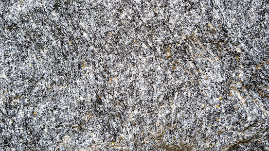 gray broken boulder background. old manor wall