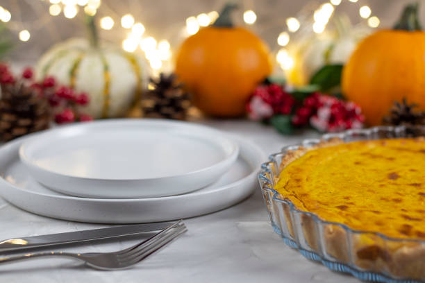 istock Thanksgiving Day. Dinner. pumpkins. bokeh. Banner. copy space 1426689497