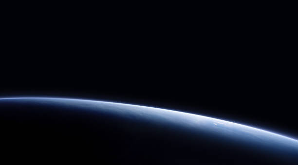 istock Blue planet Earth silhouette in black space. Abstract astronomy wallpaper. Earth orbit in space. Elements of this image furnished by NASA 1426691385