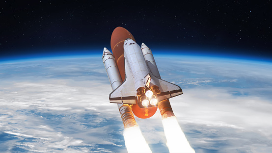 Space shuttle flight in space from Earth. Spaceship in sky. Spacecraft launch. Elements of this image furnished by NASA (url:https://images-assets.nasa.gov/image/sts129-s-069/sts129-s-069~large.jpg)