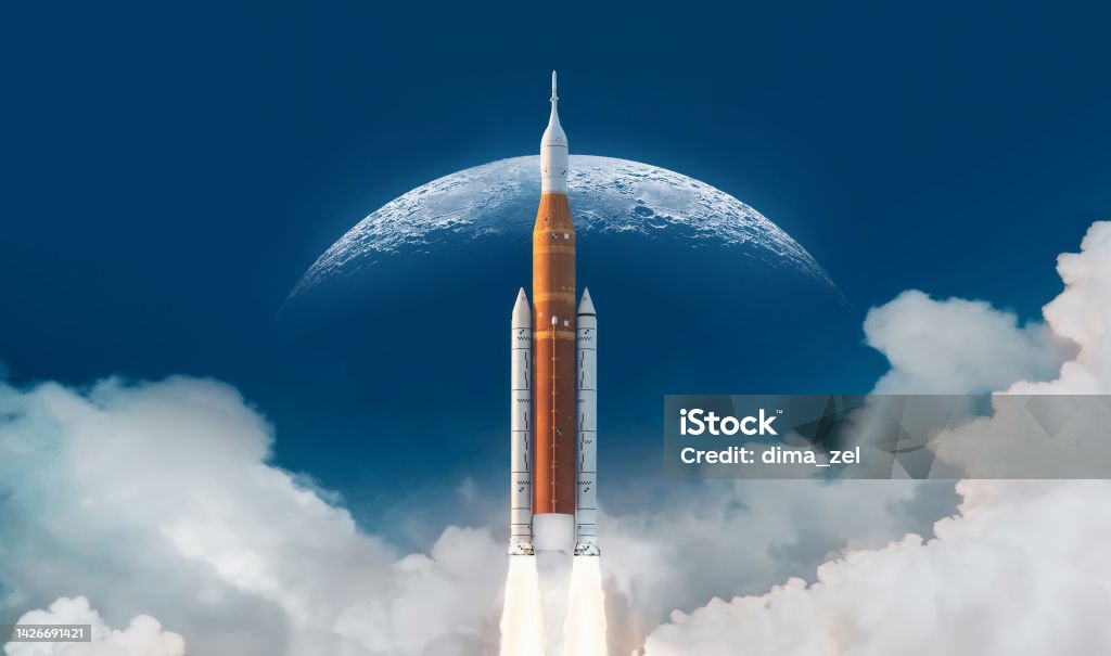 SLS space rocket in sky with clouds. Mission to Moon. Spaceship launch from Earth. Orion spacecraft. Artemis space program to research solar system. Elements of this image furnished by NASA SLS space rocket in sky with clouds. Mission to Moon. Spaceship launch from Earth. Orion spacecraft. Artemis space program to research solar system. Elements of this image furnished by NASA (url: https://www.nasa.gov/sites/default/files/thumbnails/image/ksc-20220318-ph-kls03_0079large.jpg) Rocketship Stock Photo