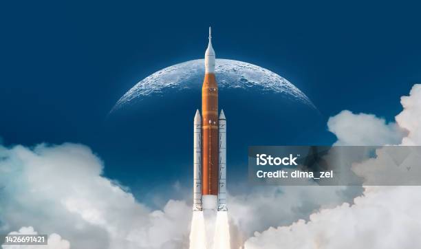 Sls Space Rocket In Sky With Clouds Mission To Moon Spaceship Launch From Earth Orion Spacecraft Artemis Space Program To Research Solar System Elements Of This Image Furnished By Nasa Stock Photo - Download Image Now