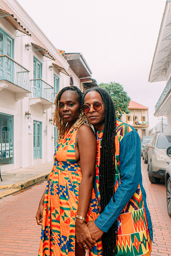 Copy Space Portrait of a Beautiful, Fashionable Afro-Descendant Male and Female Couple Standing Together in the Street in Huerta Sandoval Neighborhood of Panama City, Panama