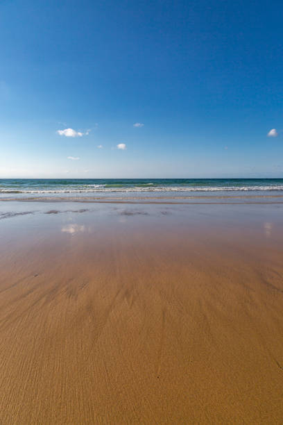 istock Perranporth beach in Cornwall on a sunny day 1426699481