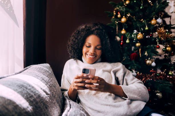 istock Cuban Woman Texting On Her Smartphone 1426708769