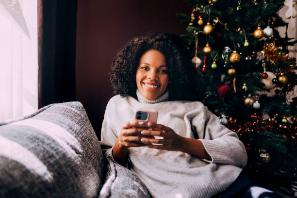 istock Cuban Woman Texting On Her Smartphone 1426708772