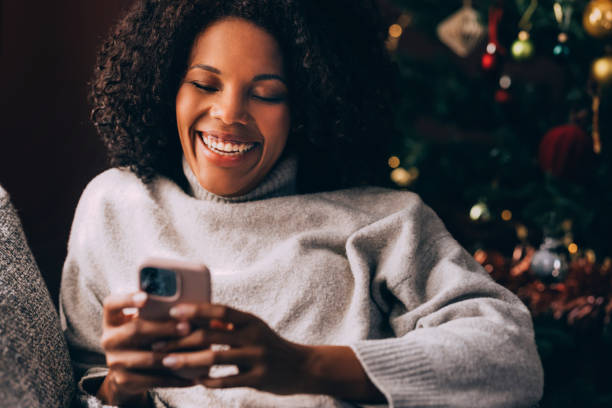 istock Cuban Woman Texting On Her Smartphone 1426708800