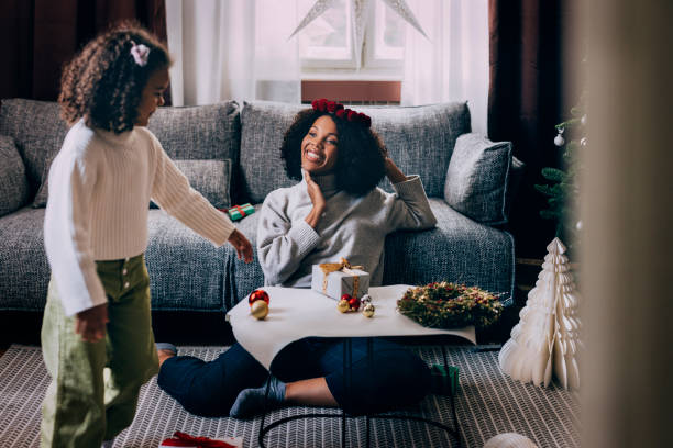 istock Mother And Daughter Playtime On Christmas 1426708872